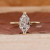 Dutch marquise diamond engagement ring crafted in cathedral setting.