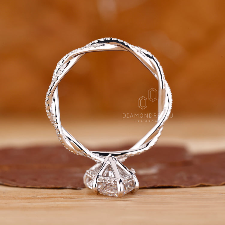 Diamondrensu UK ring with round cut pave design.