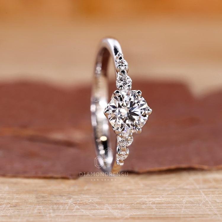 Six Round Prong Setting in lab grown diamond ring.
