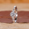 White gold diamond ring with round cut diamond ring style.