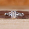 Emerald cut diamond ring in a sleek design.