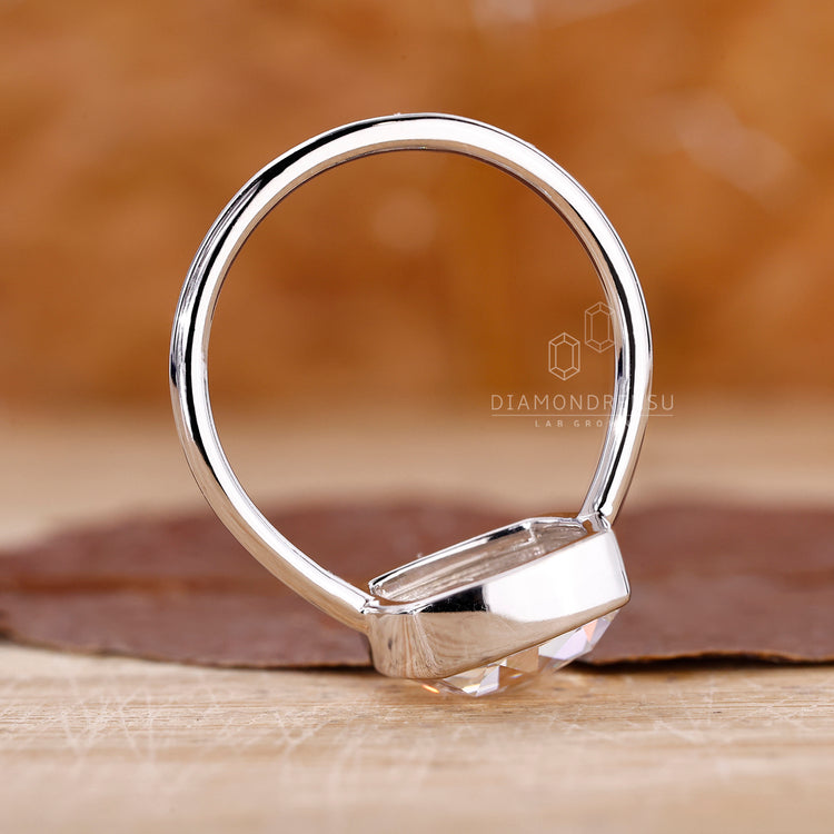 Bezel set cushion diamond ring with lab grown stone