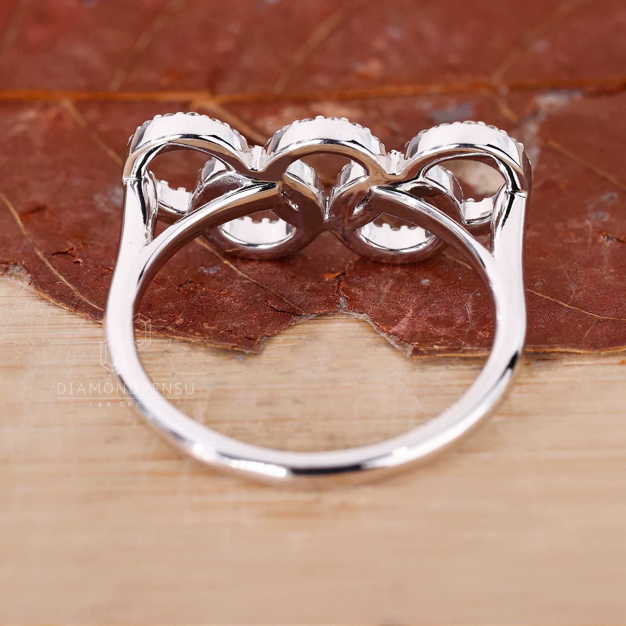 Diamond Olympic Ring includes circle shaped ring design.