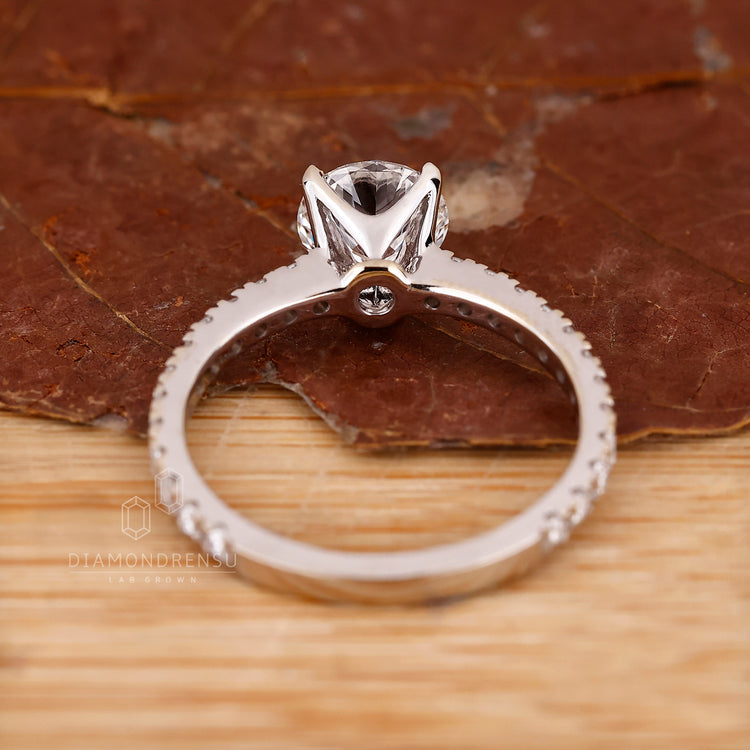 Buy engagement ring featuring round diamond.