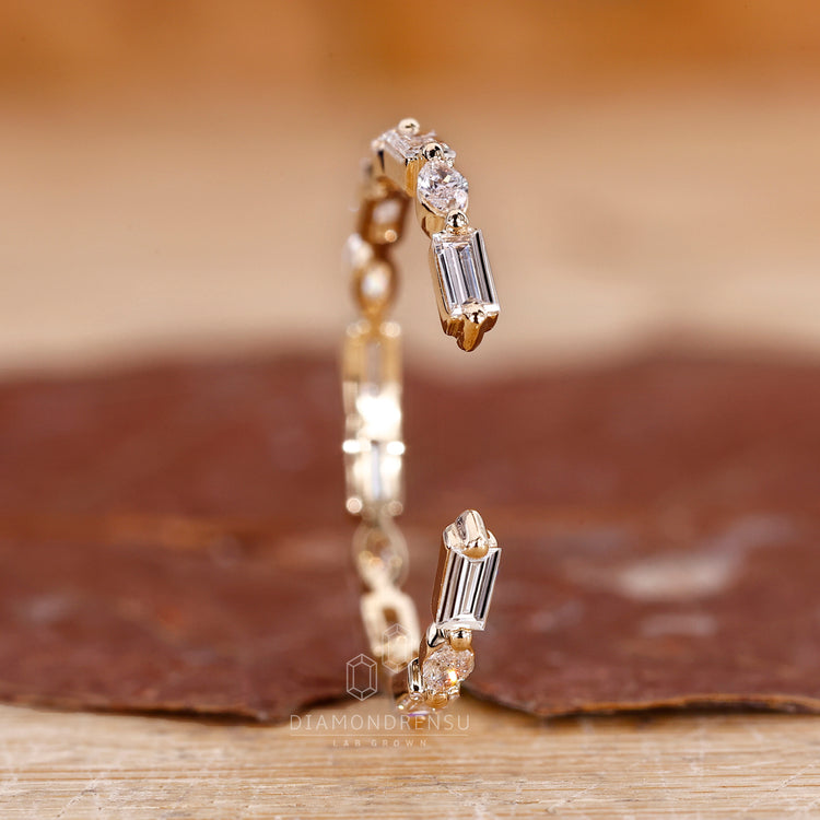 Custom diamond band handmade with marquise and baguette diamonds.