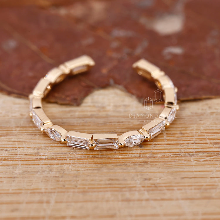 Handmade band featuring a shared prong setting for secure fit.