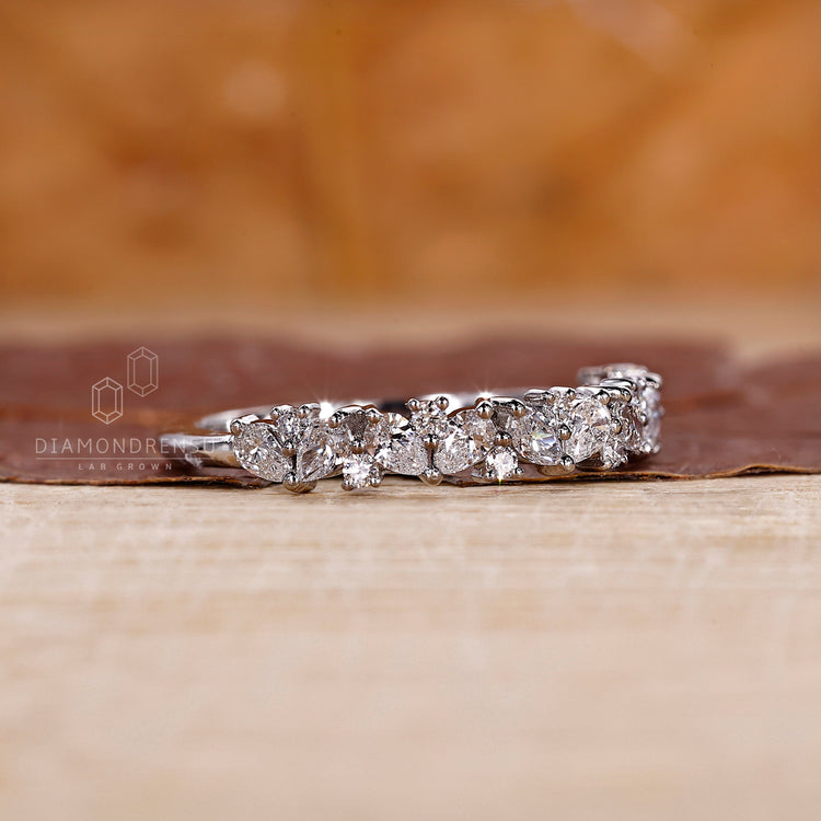 Pear cut diamond band in a teardrop design.