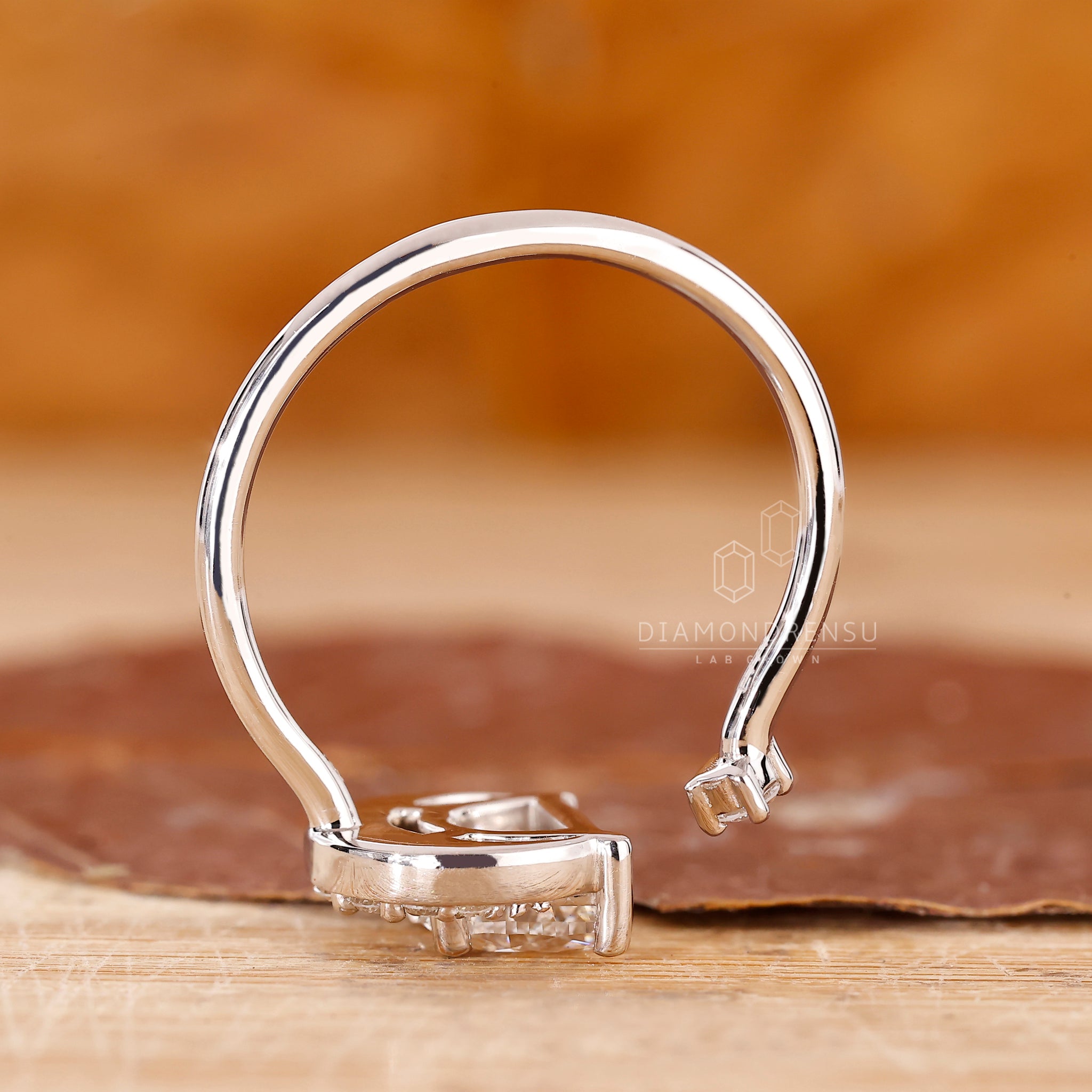 Unique half moon and round diamond engagement ring