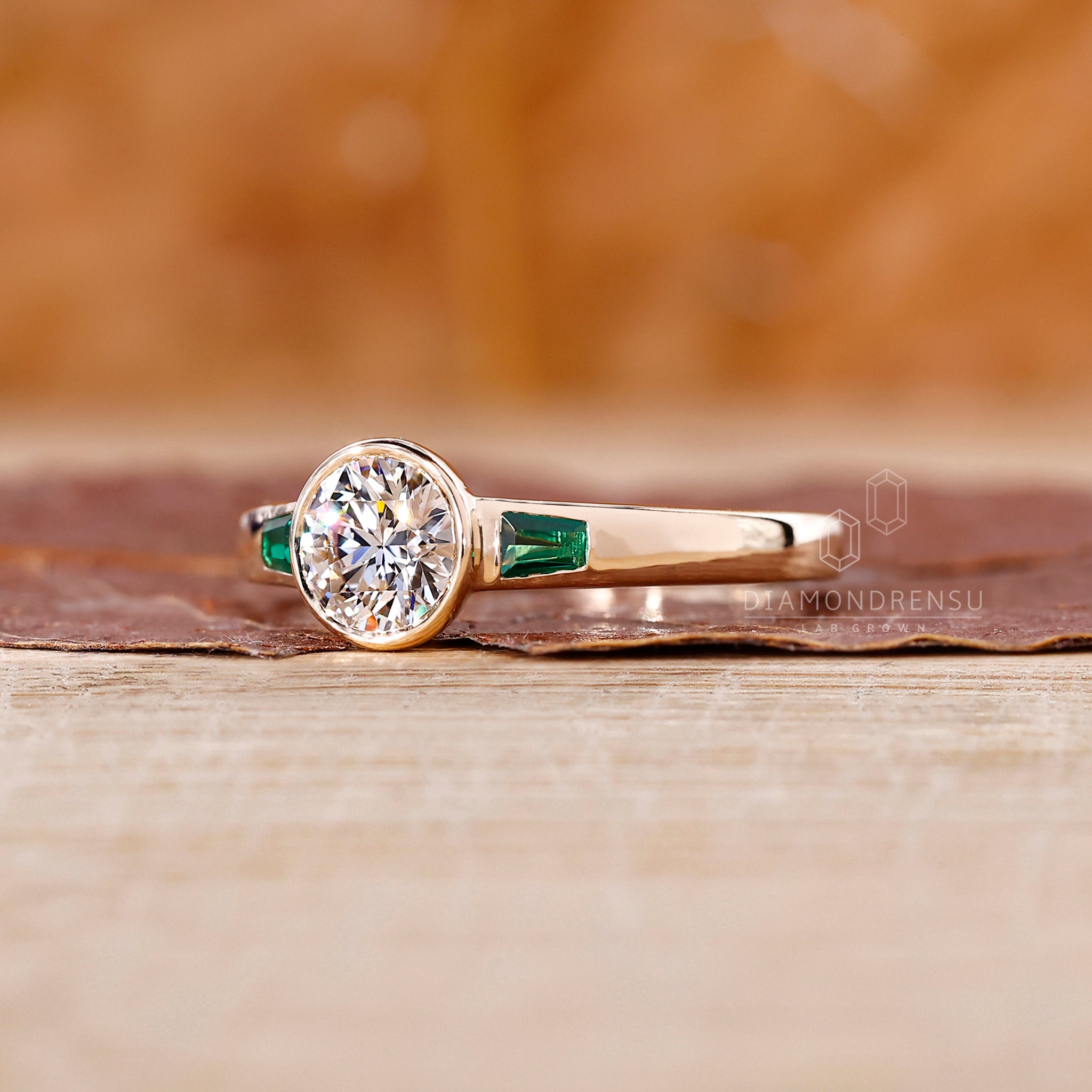 Three Stone Diamond Ring in bezel setting ring design.