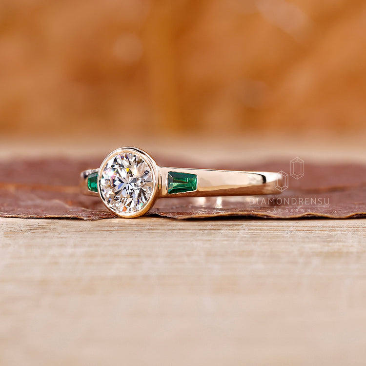 Three Stone Diamond Ring in bezel setting ring design.