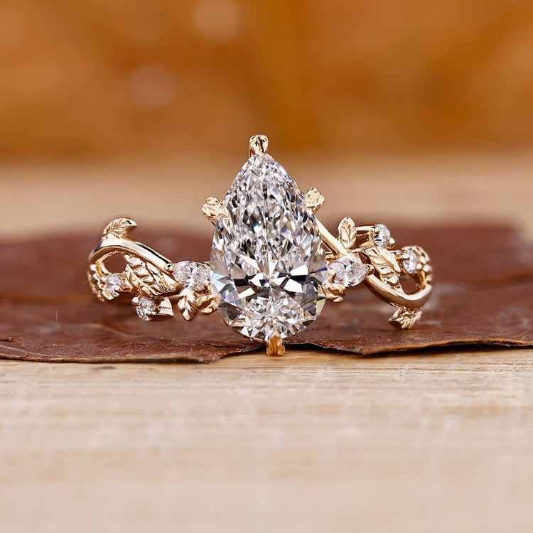 Nature Inspired Engagement Ring made in yellow gold setting.