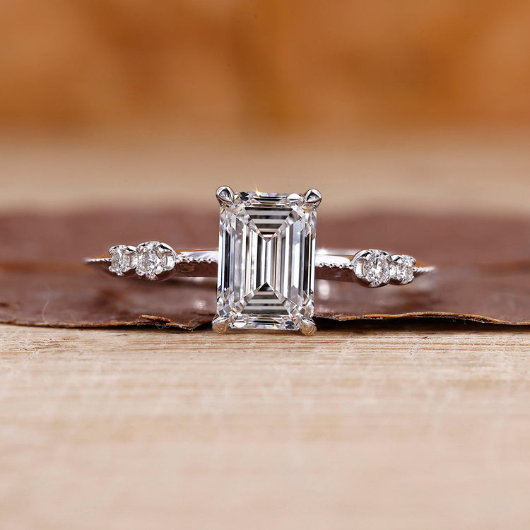 Emerald diamond ring made with lab grown diamond.