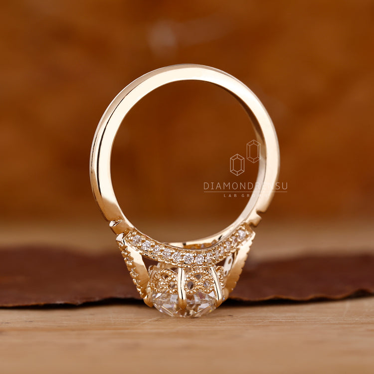 Vintage engagement ring with cathedral and bridge accents.