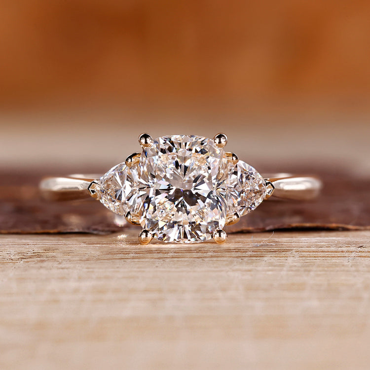 Cushion Diamond Ring With Two Trillion Side Diamond