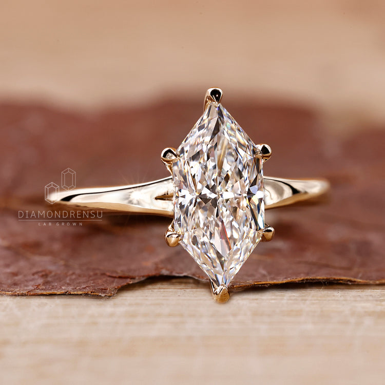 Solitaire setting in custom engagement ring design.