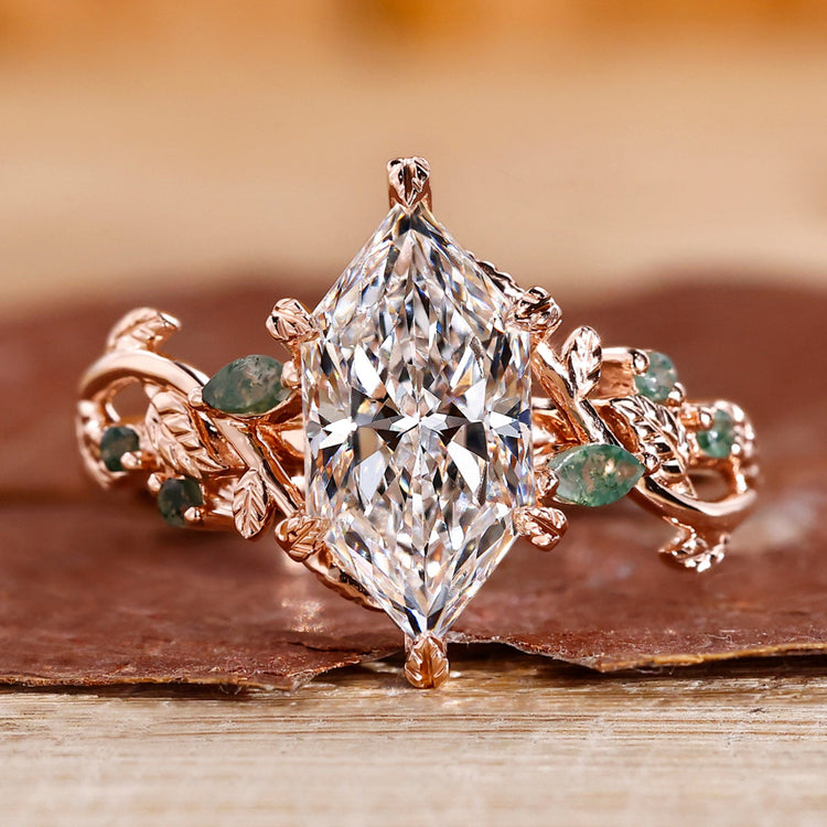 Nature inspired engagement ring with leaf-style pave