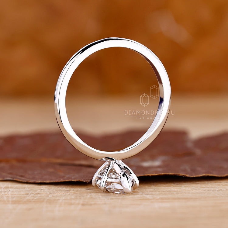 White Gold engagement ring made with hexagon solitaire diamond.