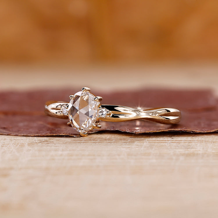 Oval cut engagement ring in yellow gold