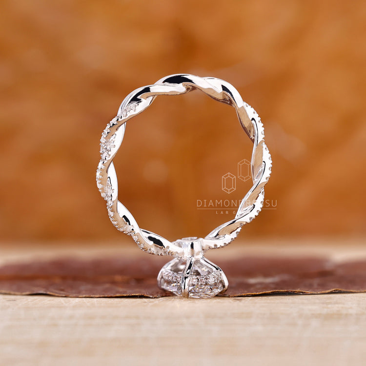 UK engagement ring in diamond twist engagement ring style.