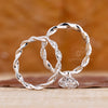 Handmade bridal set with twisted diamond band in white gold.