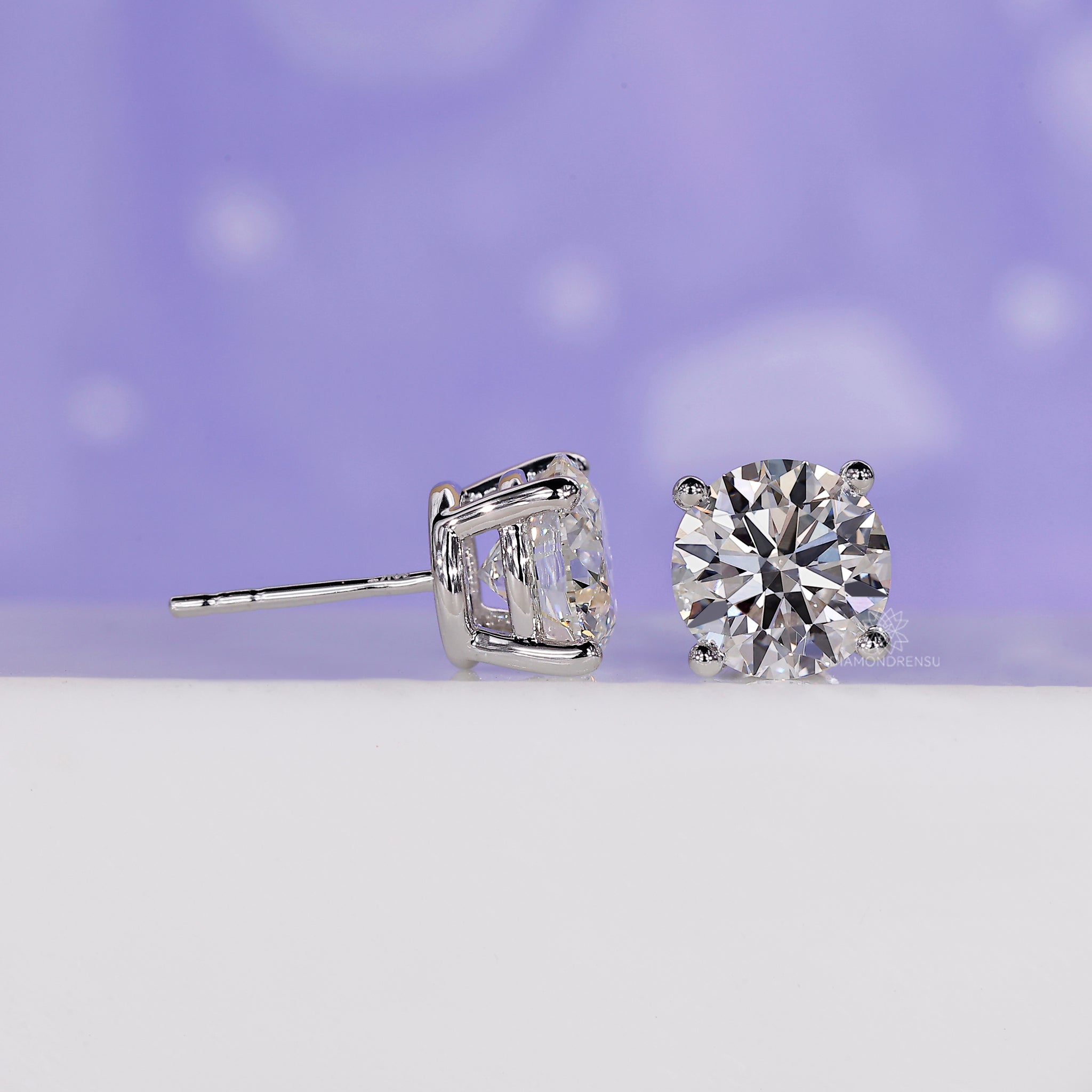Handmade diamond earrings in white gold.