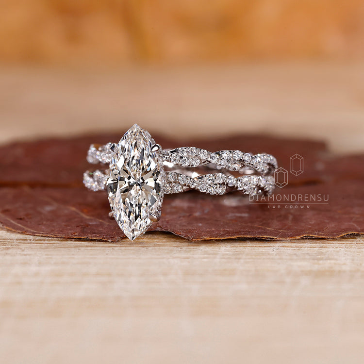 Eternity wedding band paired with twisted pave engagement ring.