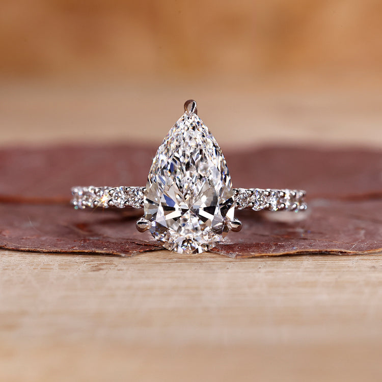 Pear diamond ring with 3 claw prong setting.
