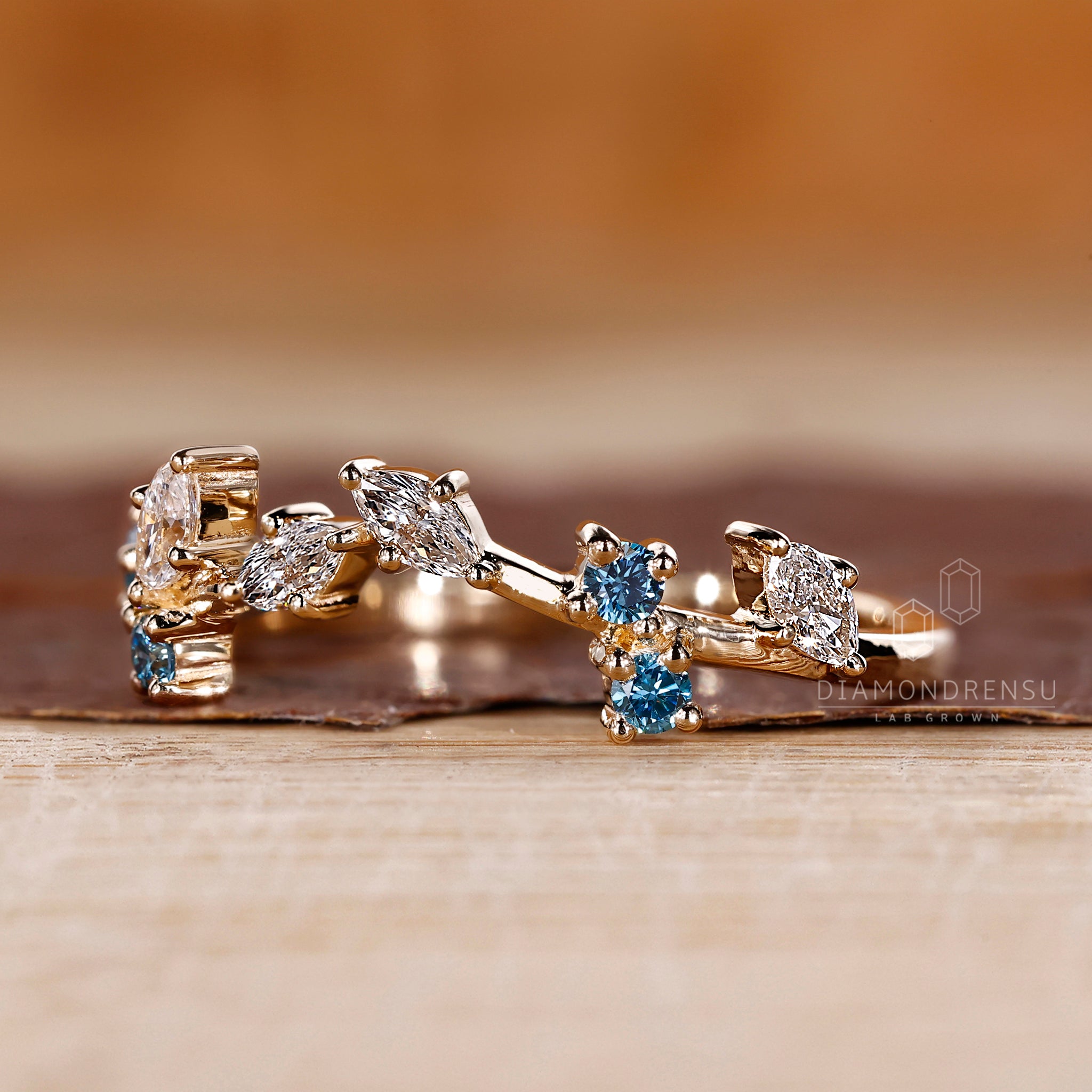 Blue diamond band featuring mixed shapes.