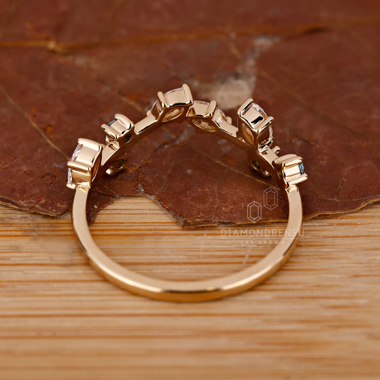 Handmade band featuring marquise and round mix.