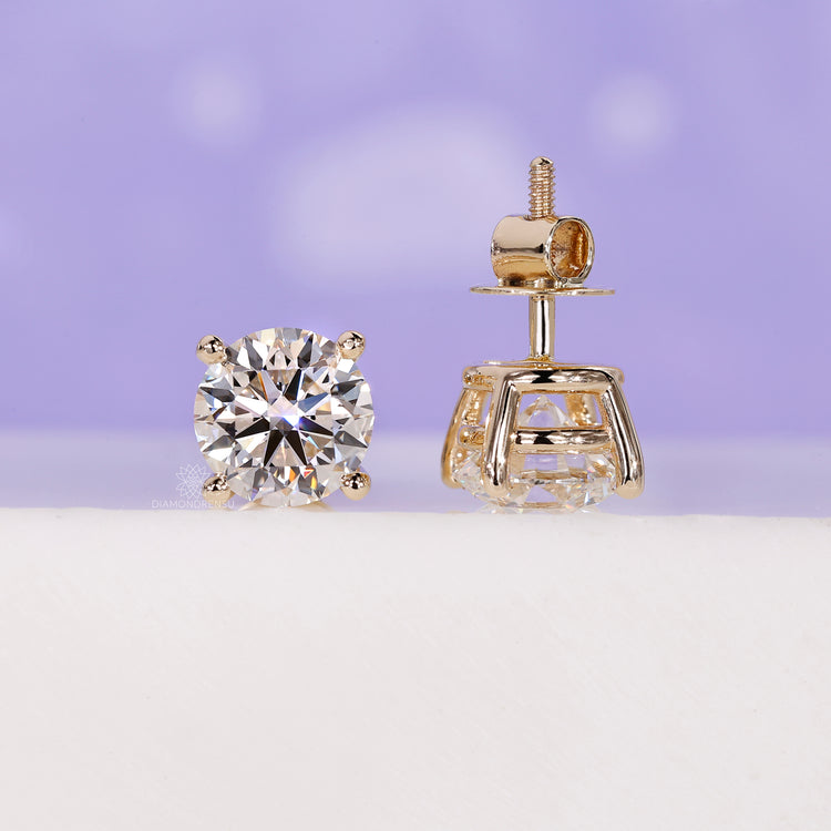 Round brilliant cut diamond earrings.
