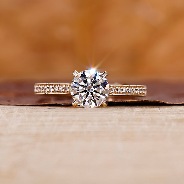 Round Diamond Engagement Ring with round cut diamond ring design.