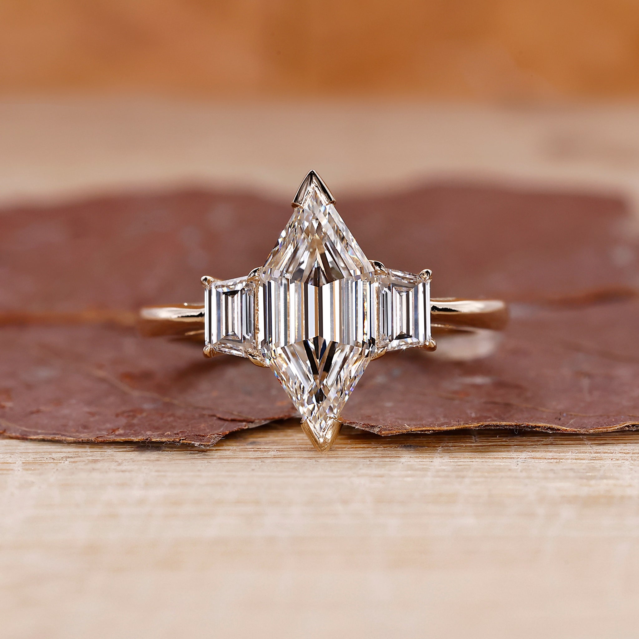 Elongated hexagon step cut ring made with lab grown diamond.