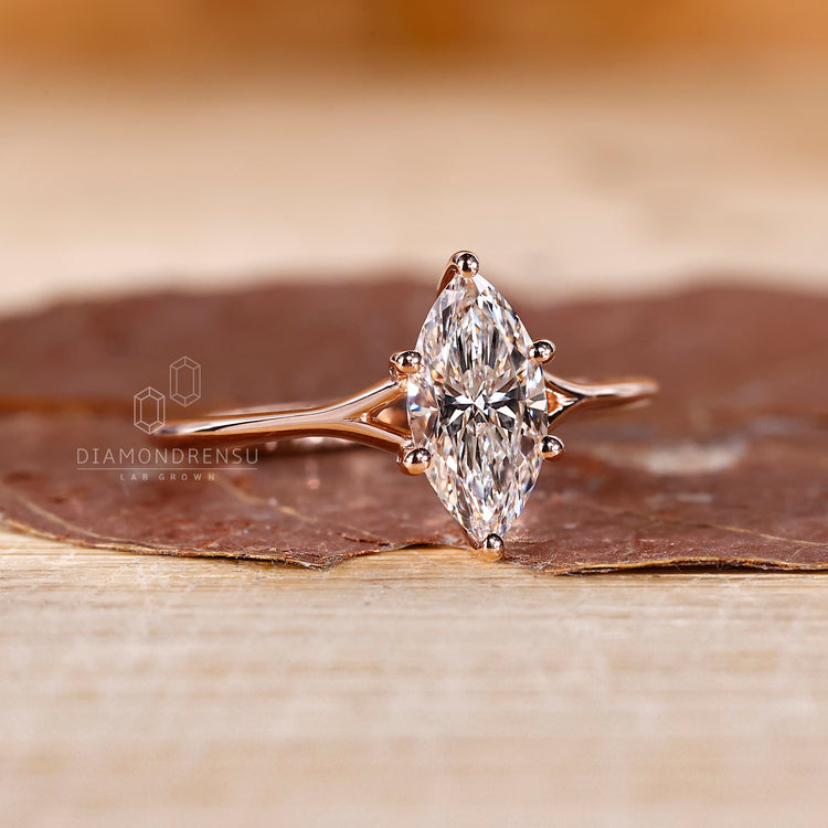 Solitaire marquise diamond ring with prong setting