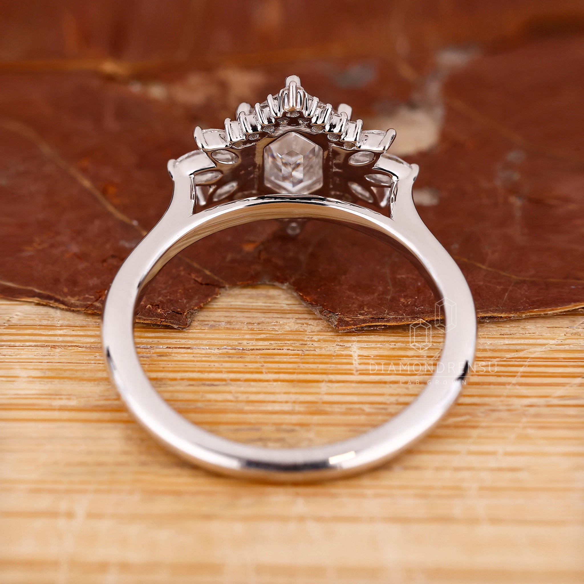 White gold ring with cathedral-style band