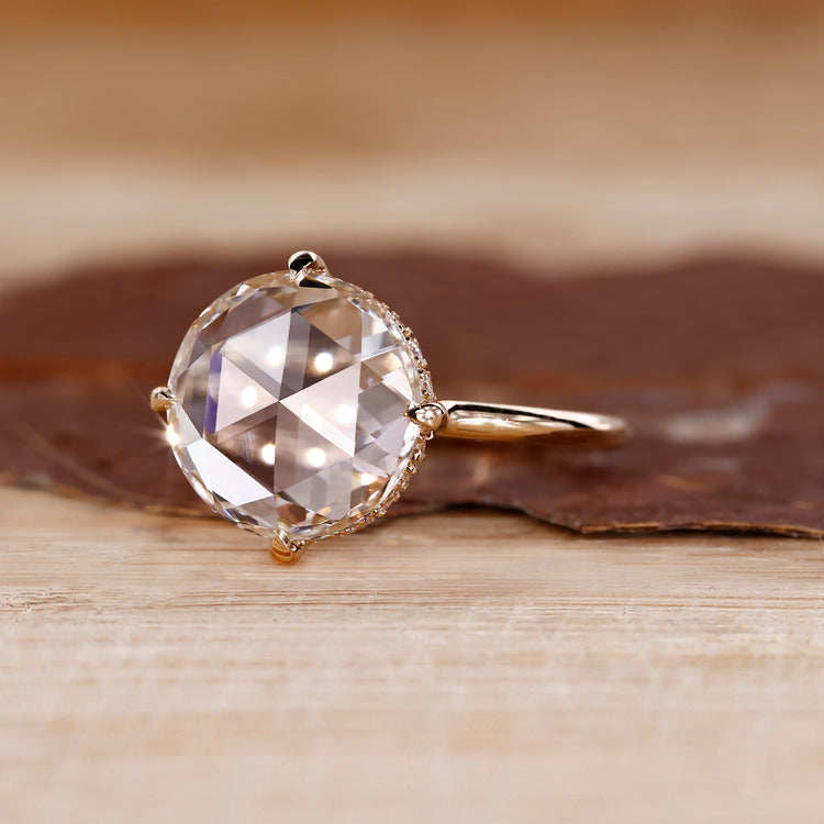 Round rose cut diamond ring with hidden halo detail.