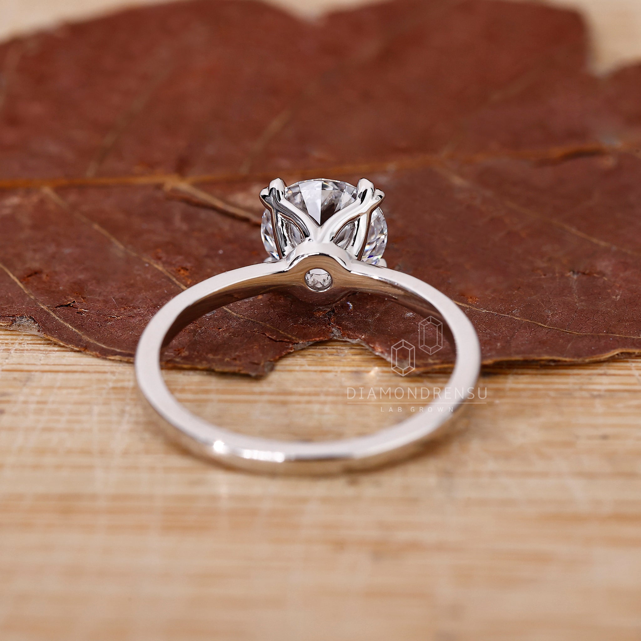 UK engagement ring with round diamond engagement ring look.