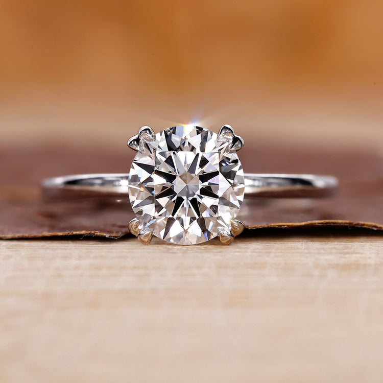 White Gold Ring with round brilliant cut diamond ring.