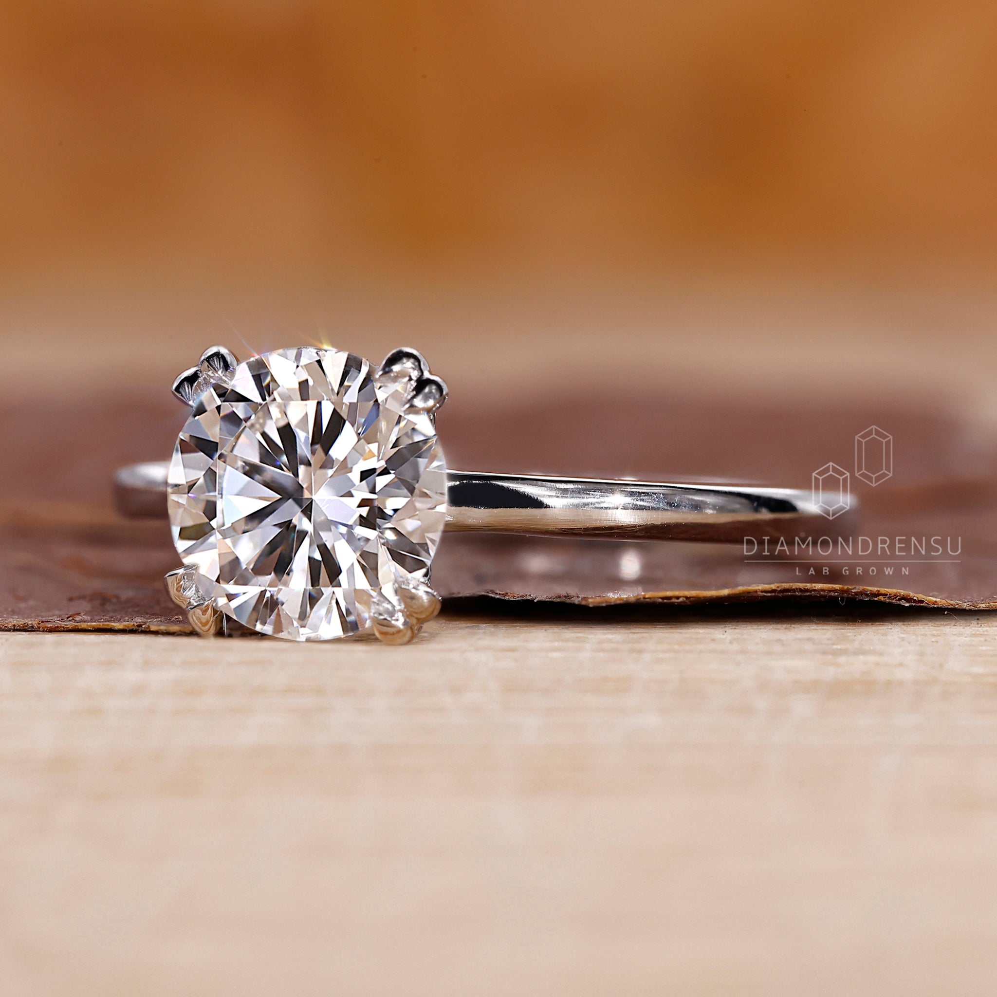 Tulip ring with solitaire engagement ring style.