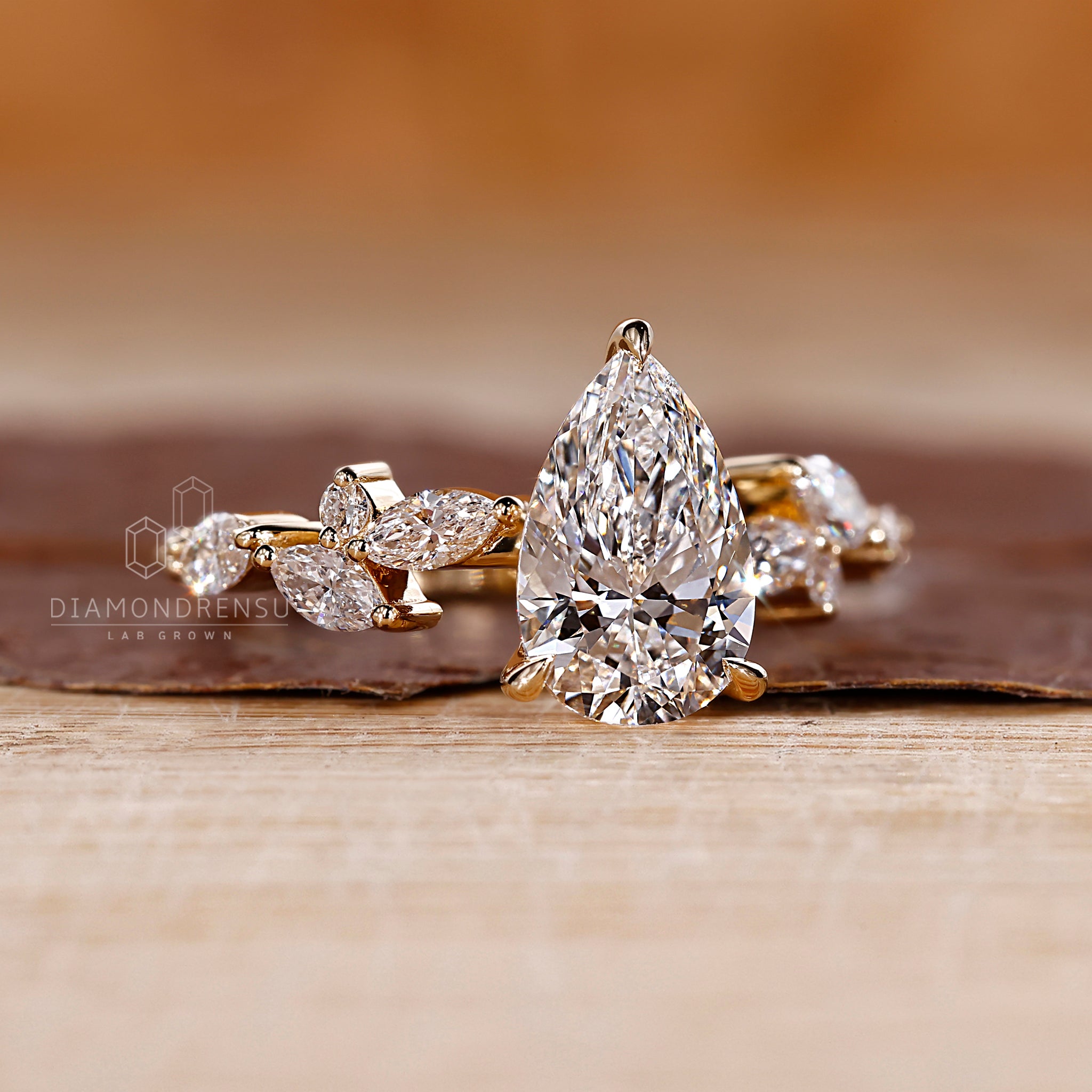 Handmade jewelry pear diamond engagement ring.