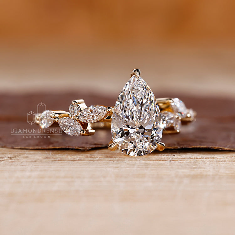 Handmade jewelry pear diamond engagement ring.