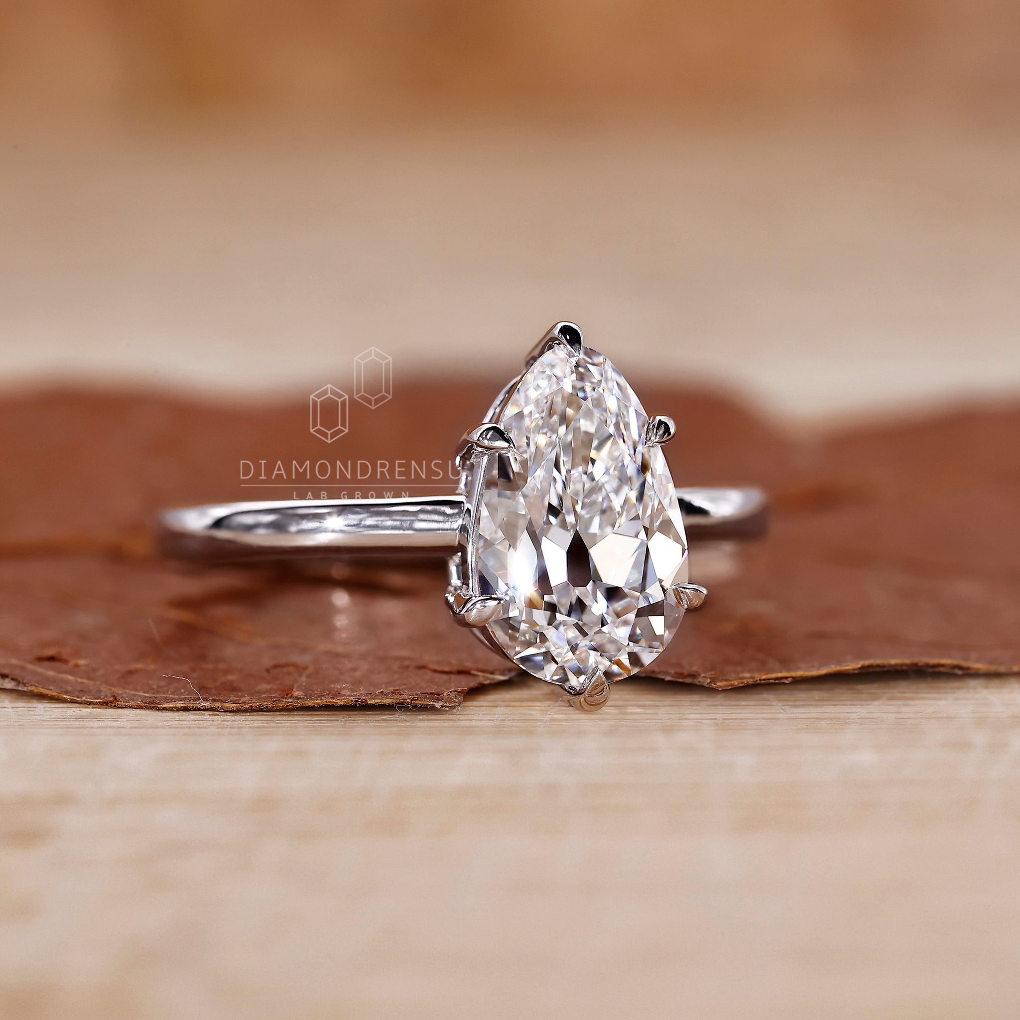 Lab grown diamond ring with white gold band and 6 prong claw setting.