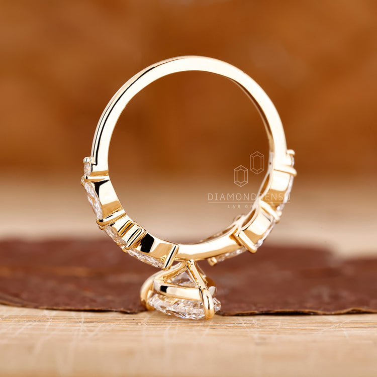 Round cut diamond ring with prong setting.