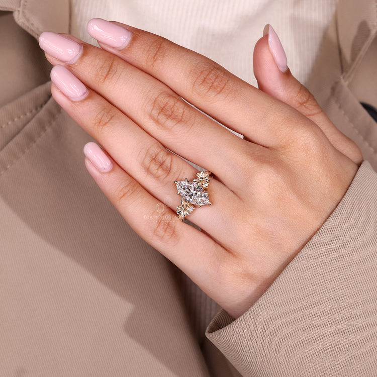 Nature style marquise ring with secure claw setting.