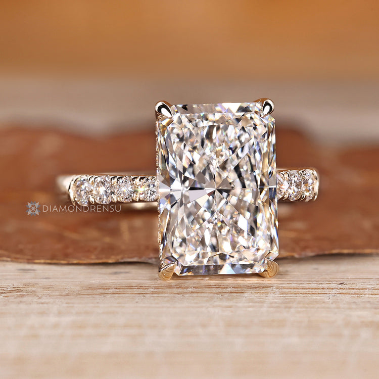 Lab grown diamond ring with four claw prong setting.