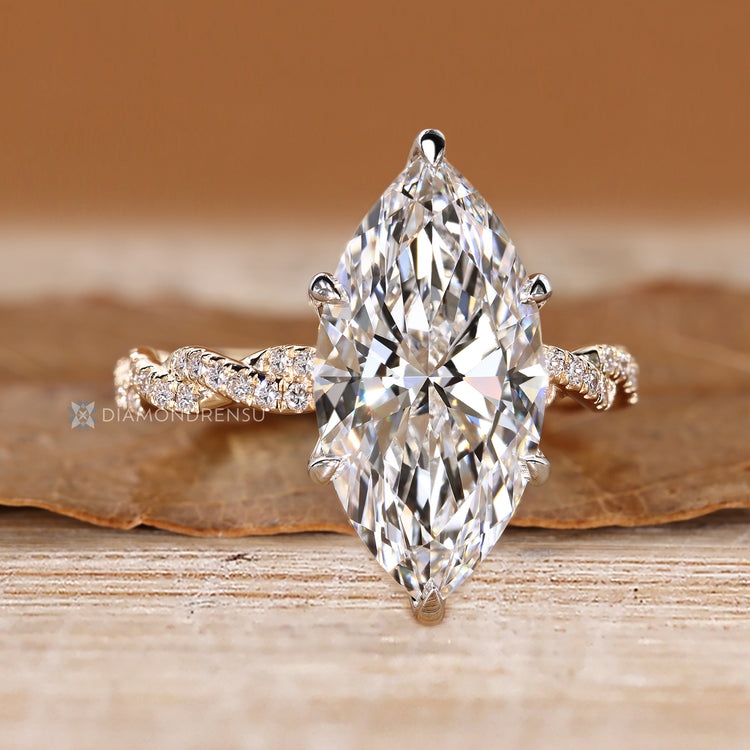 Handmade marquise ring with six claw prong setting.
