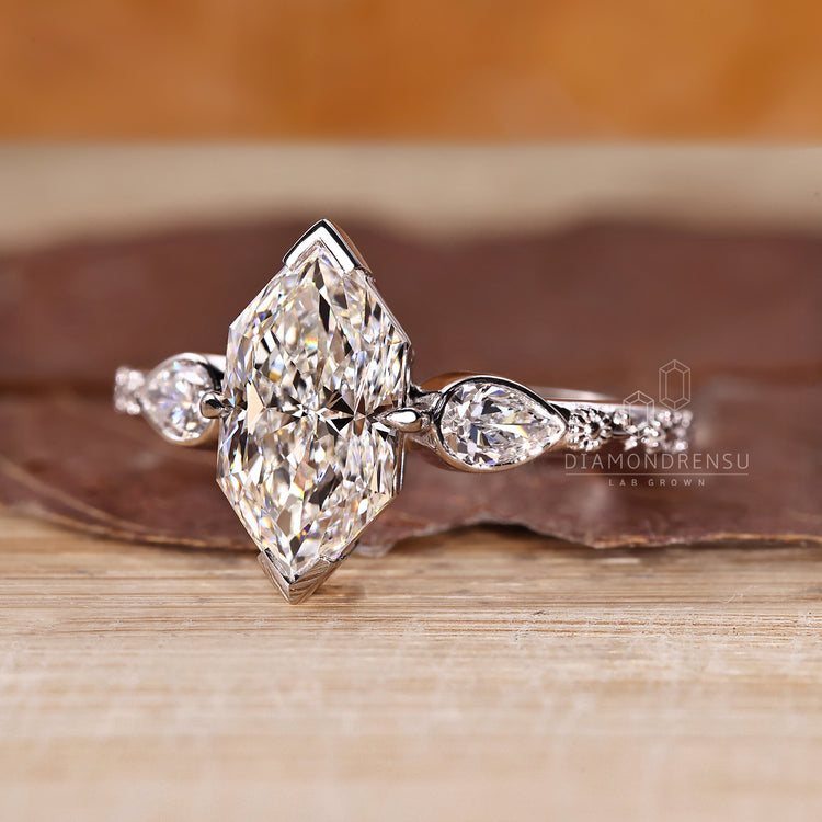 Dutch marquise ring with pear accent side stones