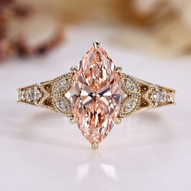 Art Deco engagement ring with pink marquise cut diamond.