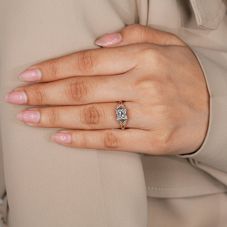 Handmade lab grown diamond ring with round side stones.