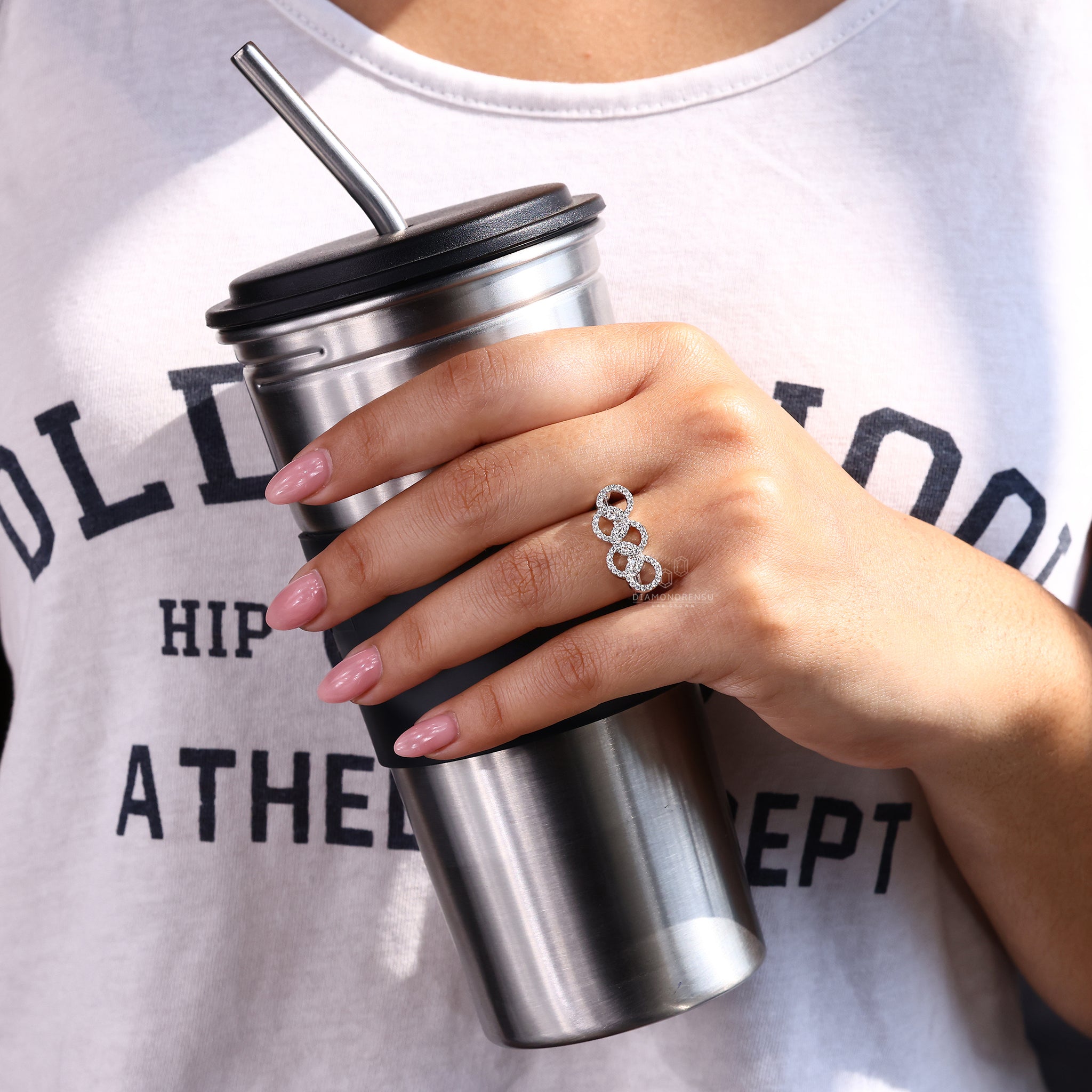 Unique Engagement Ring with round diamond placement.