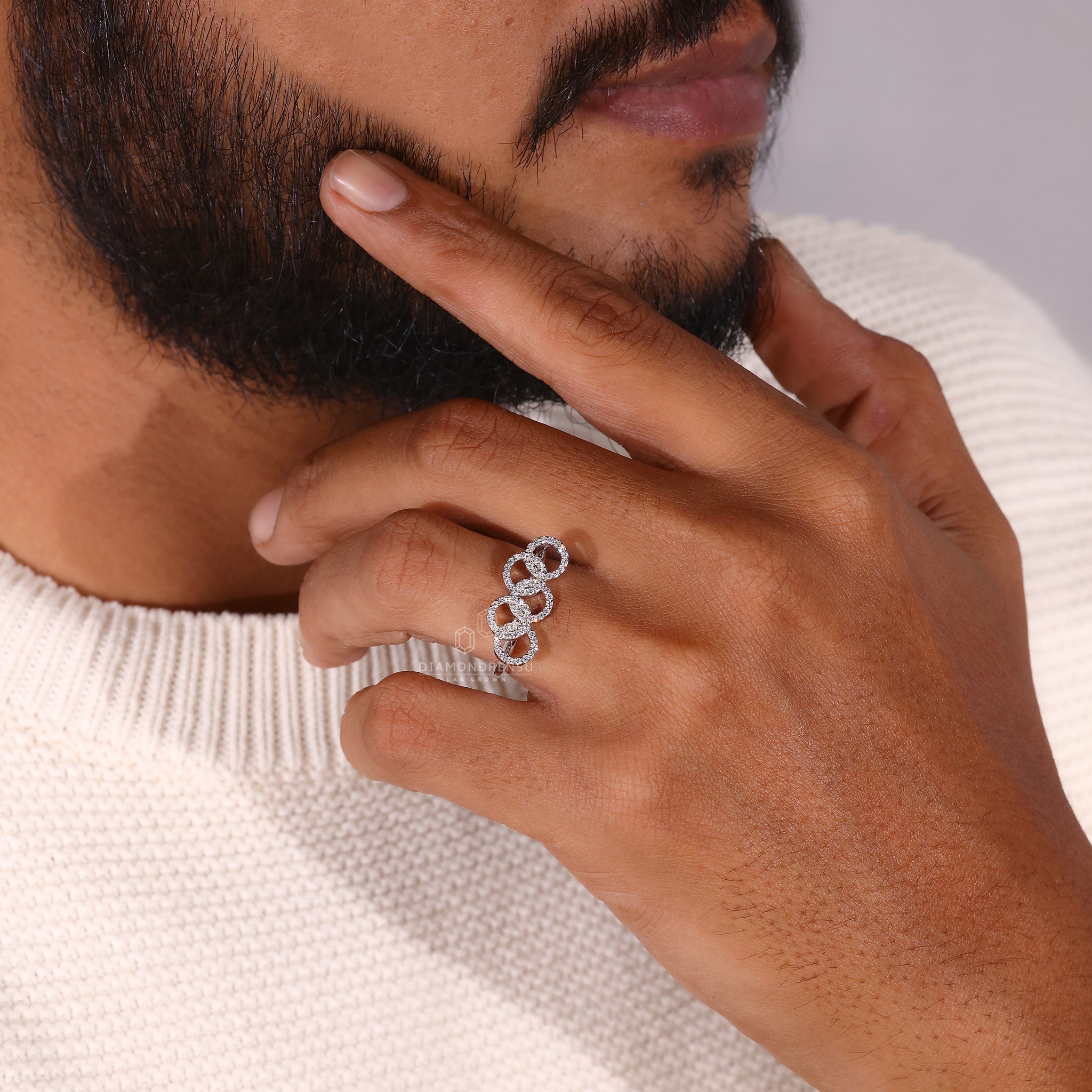 White Gold Engagement Ring designed in a circle pattern.